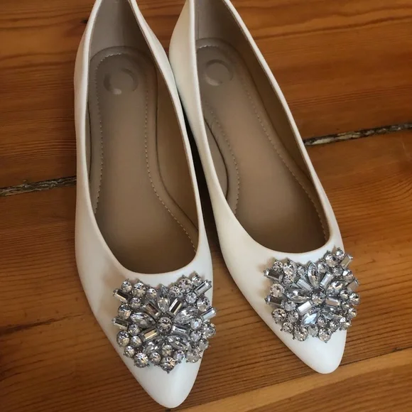 I am selling a pair of size 8 jeweled flats that have never been worn. - Picture 2 of 3
